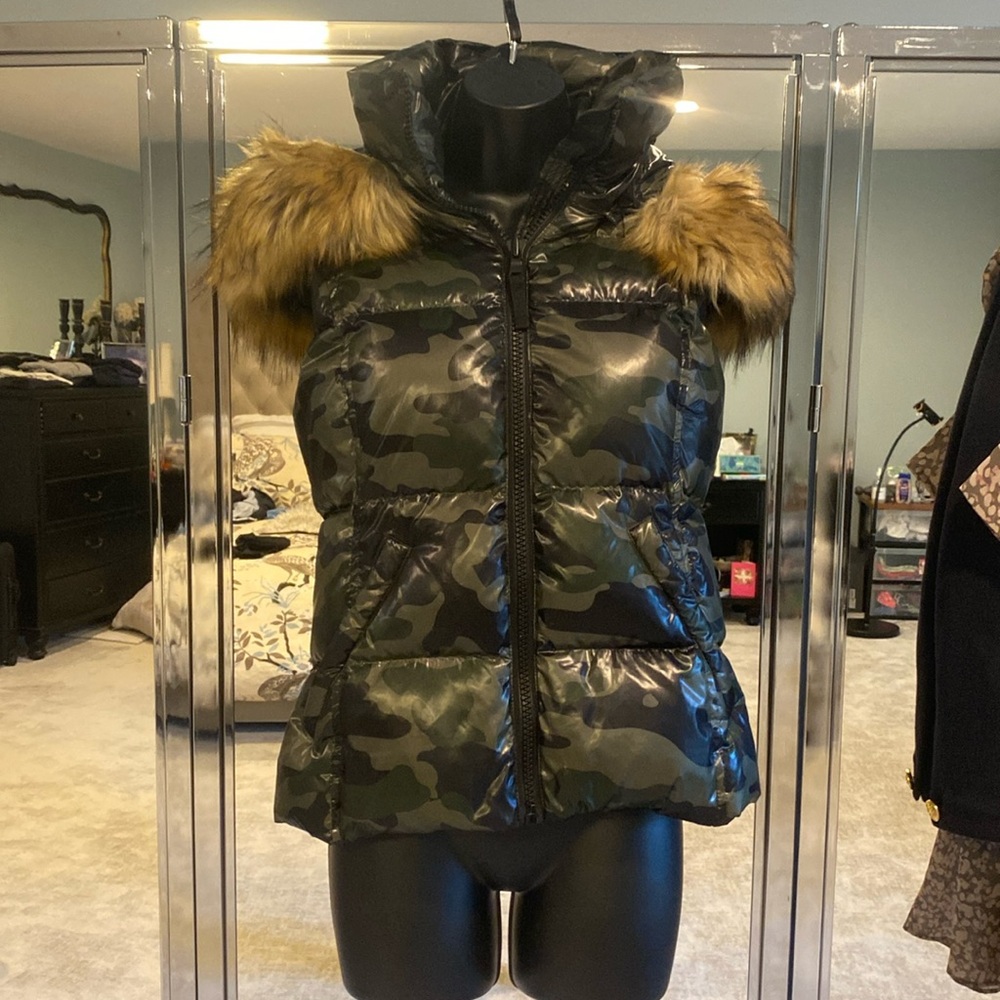 Camouflage puffer vest with detachable faux fur hood. Size small.